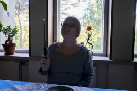 Lumia holding a wand