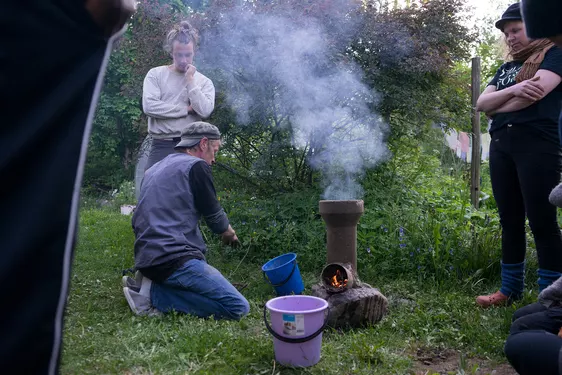 Kalle testing the rocket stove