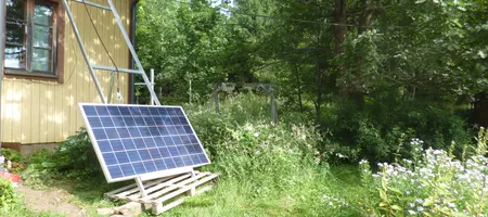 Solar panel being moved onto the roof